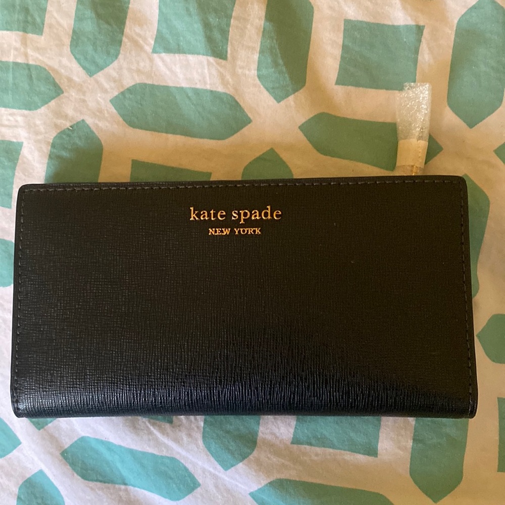 BRAND NEW WITHOUT TAGS KATE SPADE CHECKBOOK WALLET AND CARD HOLDER.